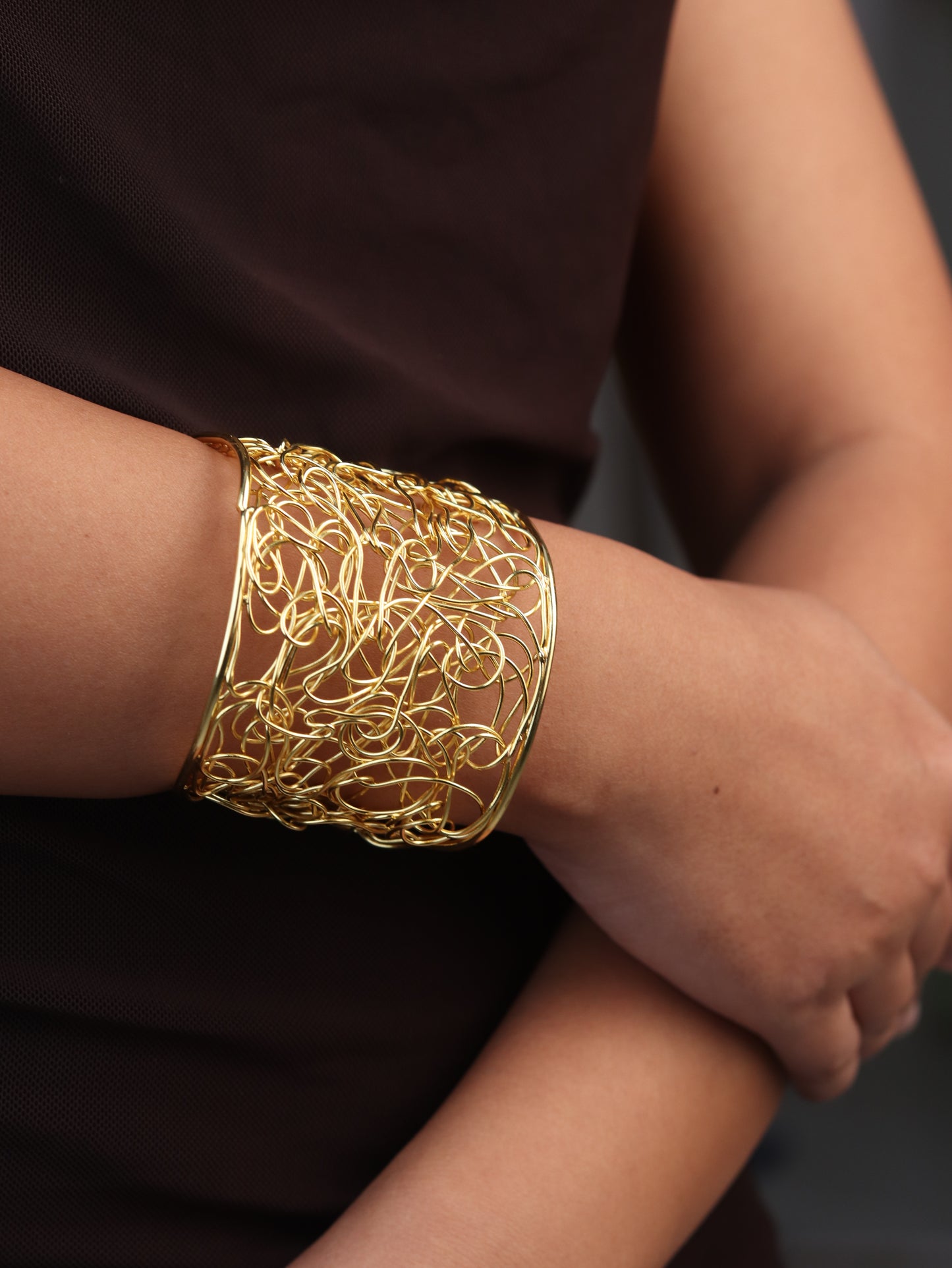 Oona string hand cuff