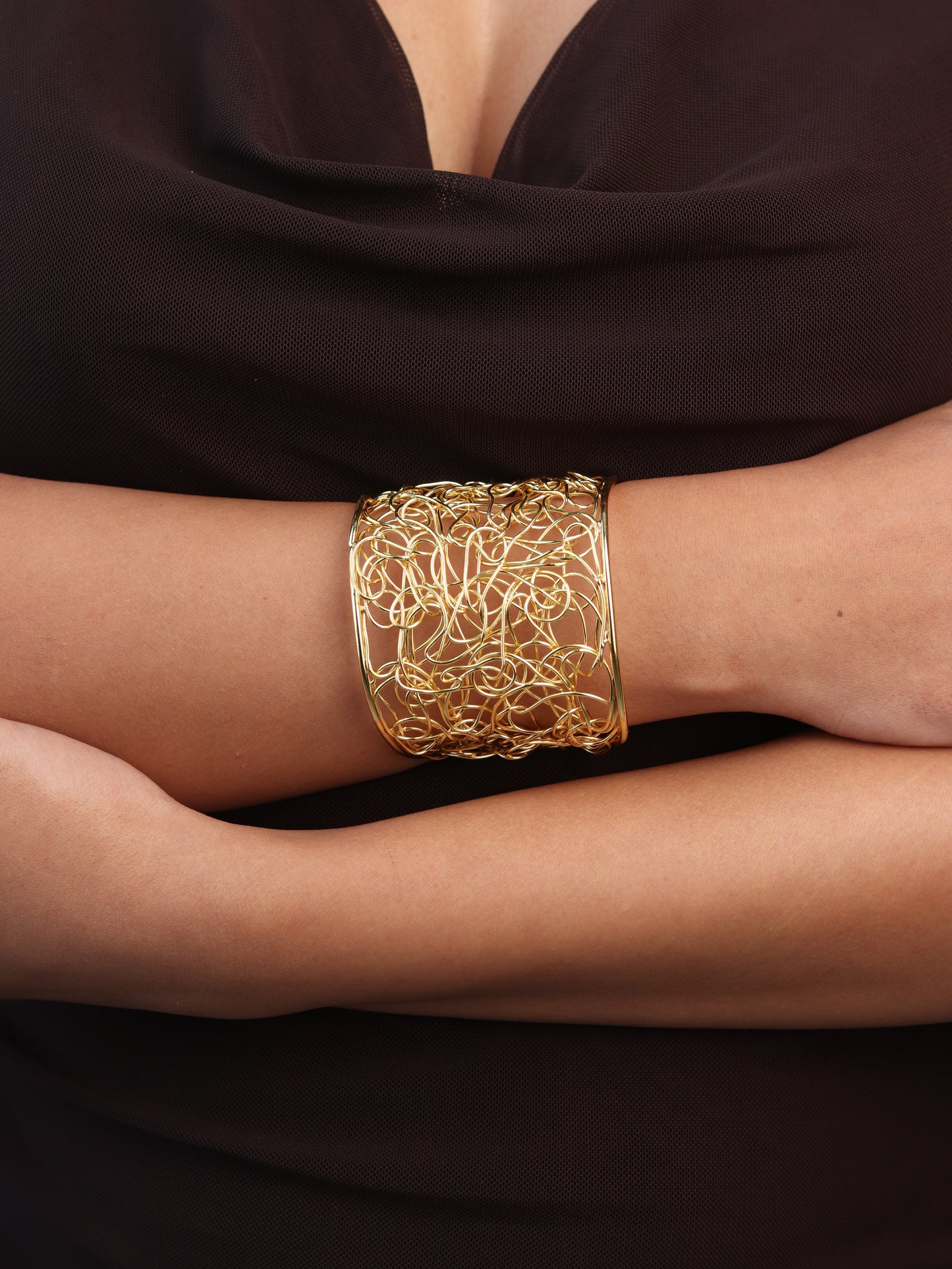 Oona string hand cuff